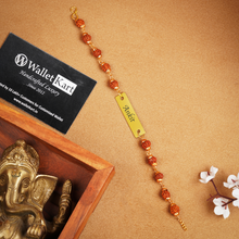 Load image into Gallery viewer, Spiritual & Stylish: Name Engraved Rudraksh Rakhi (1.0)