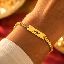 Load image into Gallery viewer, A Touch of Gold: Personalized Rakhi with Name Engraving (3.0)
