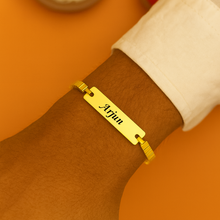 Load image into Gallery viewer, A Touch of Gold: Personalized Rakhi with Name Engraving (3.0)
